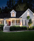 House illuminated by PAR38 Weatherproof Outdoor LED Flood Light Bulb 150W Equivalent Built Tough 40 Degree Beam 1500 Lumens