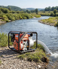 Heavy Duty 7HP Gas Powered Water Pump Pulling 242 GPM Through 3 Inch Intake, used for yard draining by a river.