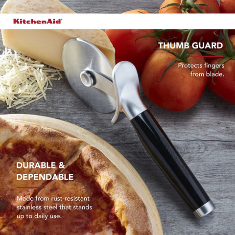 Pizza Cutter Roller Wheel With Sharp Blade For Crusts And Pies, Built In Finger Guard And Comfort Grip, next to cheese and tomatoes.