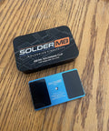 All Metal Soldering Jig For LED Strip Lights with black case on wood surface