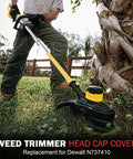 DWO1DT995 Weed Trimmer Head Cap Replacement for Dewalt being used on grass by a person wearing gloves, with trees in the background