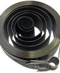 Close-up of a coiled Tempered Steel Loop End Clock Mainspring 3/4 x 0.018 x 96 Inches for Clock Repair Pros