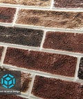 Close-up of 20 Pack Faux Brick 3D Wall Panels Peel And Stick in red brown self adhesive waterproof foam texture detail.