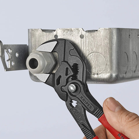 Adjusting metal box with Three Piece Black Pliers Wrench Set Built For Quick Grips And Turning The All In One Tool