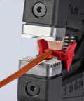 Close-up of Precise Insulation Stripper With Parabolic Blades And Auto Pullback, cutting wire with length markings visible