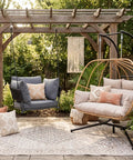 Outdoor setting with Double Egg Chair Outdoor With Stand For Two People Cushions And Headrest 80 Inch Hanging Swing Chair in brown.