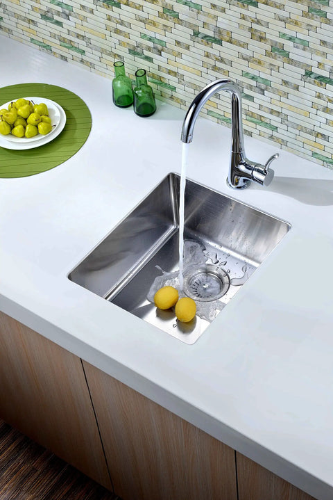 Undermount Single Bowl Bar Sink In Polished Satin Finish with running faucet and lemons in 18 by 10 chrome nickel stainless steel, 18 gauge 304 grade