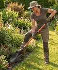 Person using Heavy Duty Spade Shovel For Digging 56 Inch Garden Shovel With Round Blade And D Handle Fiberglass Handle in garden