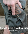 Compact Travel Laundry Washbag Featuring Patented Flex Washboard Design For Machine Grade Dirt Removal Without The Laundromat Hustle On Road Trips Camping Adventures Or Hotel Hops, shown in pocket.