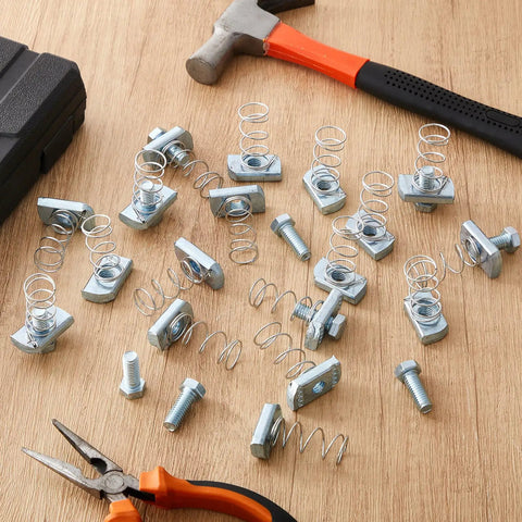 50 Piece 3/8-16 Spring Nut And Bolt Kit For Strut Channel Systems on wooden surface with tools