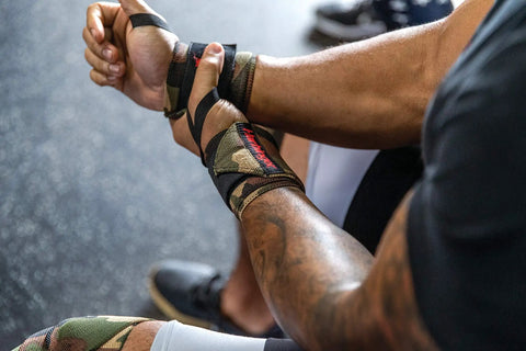 18 Inch Adjustable Weightlifting Wrist Wraps for Men and Women Pair in use at gym, showing stability and elastic support for powerlifting.