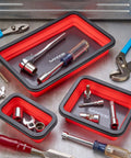 Three Size Collapsible Magnetic Parts Tray Set For Screws Bolts Nuts Washers Pins And Small Metal Parts, Non Marring Rubber Coated Magnets Protect Surfaces, Great Mechanic Gift For Men, Red, containing tools, on a workbench.