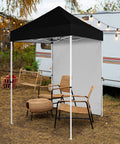 5x5 Pop Up Canopy Tent With Removable Side Wall, Easy Setup Portable Sun Shelter With Carry Bag, Your Go To Outdoor Shade For Beach, Camping, Sports And Backyard, Black, set up in campsite with chairs.