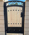 Top Shelf Matte Black Clavo Nails 50 Pack 1.5 Inch Decorative Studs For Upholstery Tacks Rustic Barn Door Hardware used in a wooden gate.