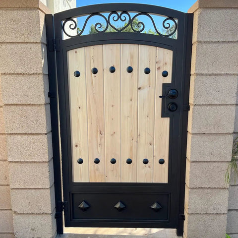 Top Shelf Matte Black Clavo Nails 50 Pack 1.5 Inch Decorative Studs For Upholstery Tacks Rustic Barn Door Hardware used in a wooden gate.