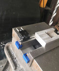 Magnetic Parallel Keepers for Vise and CNC Machining with blue powder-coated aluminum, ultra-strong rare earth magnets in use on a vise.