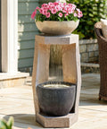 32 Inch Outdoor Fountain With Modern Geometric Two Bowls Water Feature And LED Lights Resin Durable Cascading Waterfall For Patio Backyard Garden Or Porch visible on patio with flowers