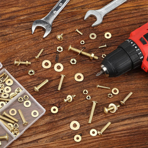 Heavy Duty Galvanized Iron Bolts And Nuts Assortment Kit With Washers 113 Piece hardware set with tools and fasteners on a wooden surface.