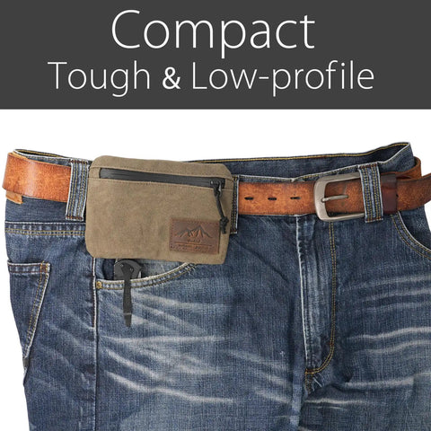 Low Profile Belt Zipper Pouch for Men and Women in olive waxed canvas, attached to jeans, anti-theft, with YKK zipper.