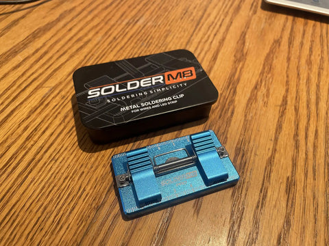 All Metal Soldering Jig For LED Strip Lights with Magnetic Clamp on wooden surface