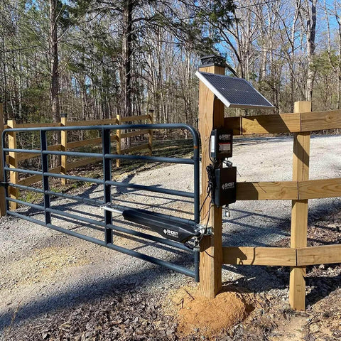 Automatic gate opener with AXLC Security Kit Locking Clevis Pin For Automatic Gate Opener Systems installed on wooden post.