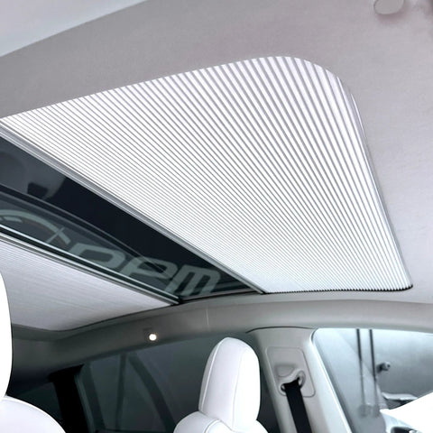 Fully Retractable Aluminum Sunroof Sunshade For Tesla Model Y installed on panoramic roof, smooth finish, heavy duty heat blocker.