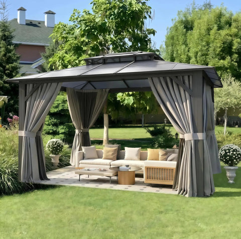 10x12 Hardtop Aluminum Framed Outdoor Gazebo With Double Polycarbonate Roof For Patio And Garden Hangout Ready Durable Pavilion With Curtains And Netting, UV Protection And Easy Setup For Lawn And Backyard shown installed in a garden.