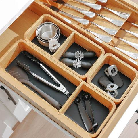 Modular Bamboo Drawer Organizer Set With Magnetic Containers And Removable Inserts shown in a kitchen drawer