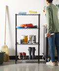 Four-Shelf Steel Wire Garage Storage Shelves Heavy Duty With Adjustable Metal Unit, Each Shelf Holds Up To 200 Lbs, 800 Lbs Total Capacity, 23.2 In Wide By 48 In High By 13.4 In Deep, Black, Ideal For Tools, Gear And Supplies In Workshop Or Garage with paint cans and boots