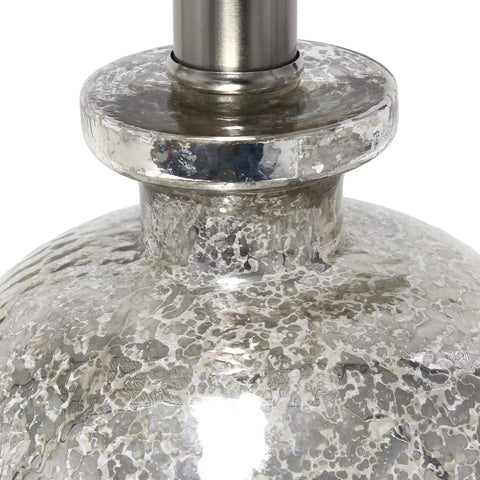 Close-up of textured glass detail on Textured Glass Table Lamp With Clear Blue Dome Base And White Fabric Drum Shade.