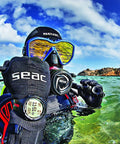 Diver wearing Get Your Hands On This Awesome Scuba And Freediving Dive Computer That Comes Packed With A Handy Dive Logbook in the water