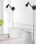 Oil Rubbed Bronze 8 Inch Adjustable LED Wall Sconce Plug In Wall Lamp With Dimmer Switch Clear Glass Shade installed in living room
