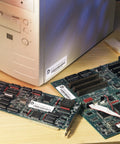 Hella Tough Waterproof Mailing Labels 1 X 2 5/8 Inches White on computer motherboard for labeling electronics.