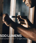 Person using PL500 Penlight 500 Lumens, Five Modes, Rechargeable Mini LED Flashlight With Magnetic Base And Pocket Clip