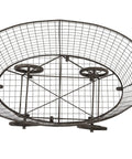 Bottom view of Old School Vintage Metal Laundry Basket On Wheels With Durable Frame In Gray Finish, showing wire mesh and wheels.