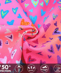 Colorful heart pattern fabric from Girls 2 Piece Long Sleeve Rash Guard Swimsuit Set With UPF 50 Plus Sun Protection Quick Dry Fabric And Four Way Stretch For Toddlers And Kids 6 Months To 8 Years Beach Day Ready For Water Fun