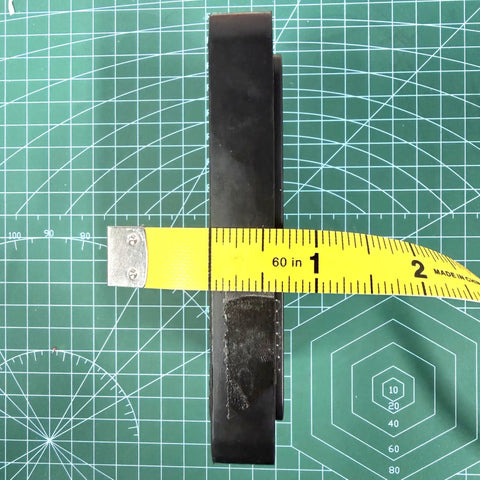 Side view of Heavy Duty Rubber Arm Pad Set For Benwil And Bishamon Weightlifting Equipment with measuring tape showing width