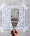 Applying plaster through Six Pack Knockdown Texture Spray Stencil Kit For Drywall Repair And Plaster Walls 8x8 Inch Plastic Texture Stencil Tools For Wood Walls And Ceilings DIY Pro Grade Supplies on wall.