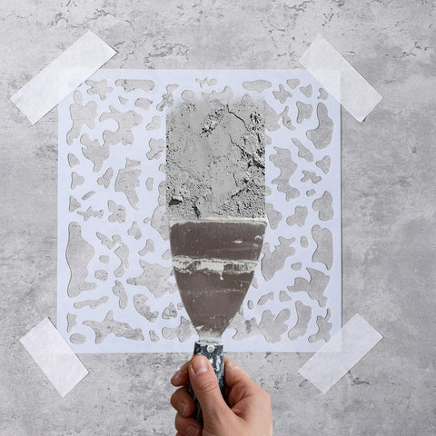 Applying plaster through Six Pack Knockdown Texture Spray Stencil Kit For Drywall Repair And Plaster Walls 8x8 Inch Plastic Texture Stencil Tools For Wood Walls And Ceilings DIY Pro Grade Supplies on wall.