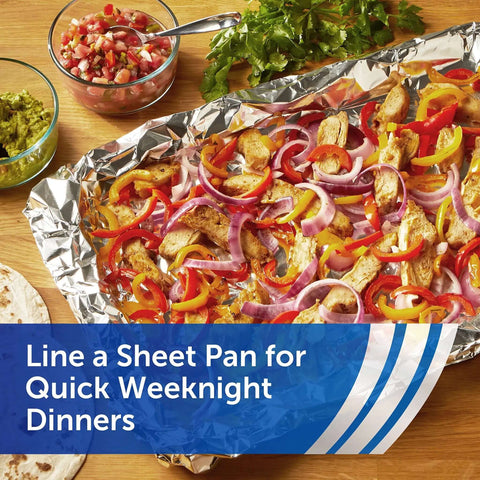 Baked fajitas with red onions and bell peppers on Everyday Strength Aluminum Foil Roll For Freezer And Grill Safe Cooking