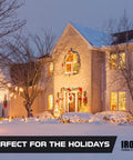 Festively lit house exterior displaying holiday decorations at dusk, ideal scene for 12 Gauge Outdoor Extension Cord 25 Ft Built Tough.