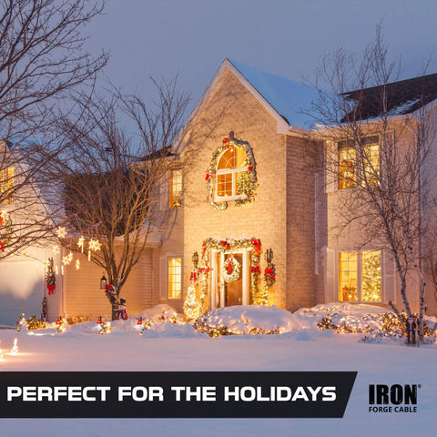 Festively lit house exterior displaying holiday decorations at dusk, ideal scene for 12 Gauge Outdoor Extension Cord 25 Ft Built Tough.