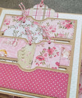 Stitched Slots Pocket Die Cut Set for card making in a scrapbook with floral and polka dot design, showcasing large 4.88x5 inch pockets.