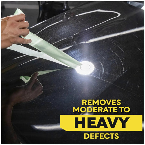 Close-up of Ultra Cut Car Compound being applied to glossy paint for heavy defects and scratches removal, highlighting a polished finish.