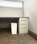 Solid Built 9 Gallon Under Sink Trash Can And Waste Basket For Kitchen Bathroom Or Office Room Featuring A Tough Reinforced Rim Plus Smooth Wipe Down Interior That Makes Spills An Absolute Breeze To Clean Up Today in an office setting.