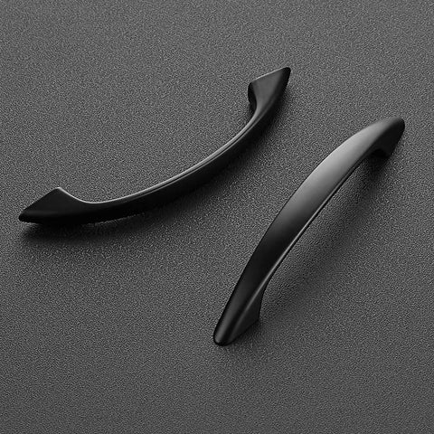30 Pack 3 Inch Matte Black Cabinet Handles for Cabinets and Drawers shown on textured surface