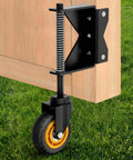 4 Inch Gate Wheel With Spring Loaded Absorbing Solid Rubber Tire For Wooden Fence Gates 260 Lbs Capacity No Tools Needed For Quick Mount Includes Screws And Screwdriver Black Left Orientation attached to wooden gate.