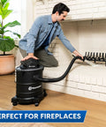 Man using 6 Gallon Ash Vacuum With 8 Amp Motor, Ultra Quiet Power, Beefy Suction, Portable Shop Vac near a fireplace