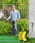 Man watering garden with 2 Ft Stainless Steel Garden Hose With Male To Female Connector For Reels And Reel Attachments