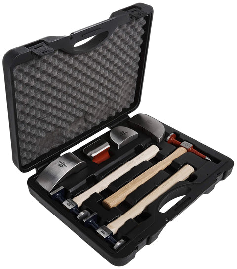 7 Piece Auto Body Hammer And Dolly Set For Dent Repair Built With Flame Treated Hickory Handles And Highly Polished Dollys displayed in open case